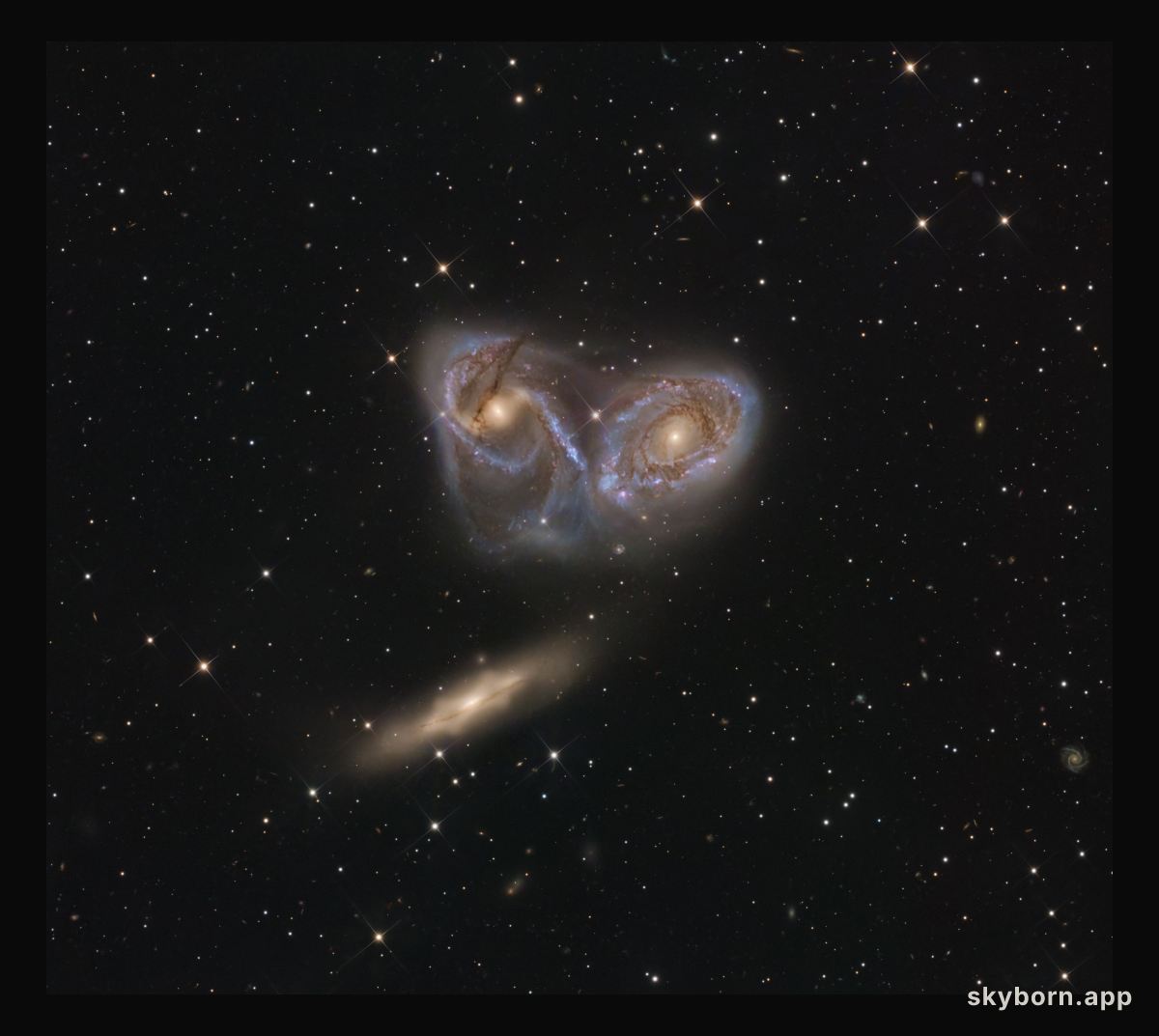 Three Galaxies in Pavo